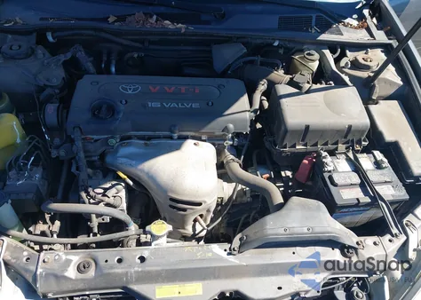 2003 Toyota Camry Le z USA, uszkodzony, nr VIN JTDBE32K930149280